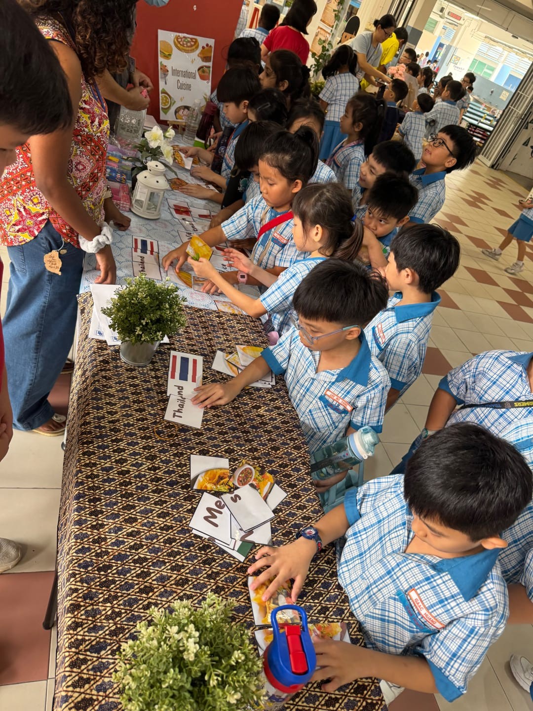 Students at an activity booth during IFD