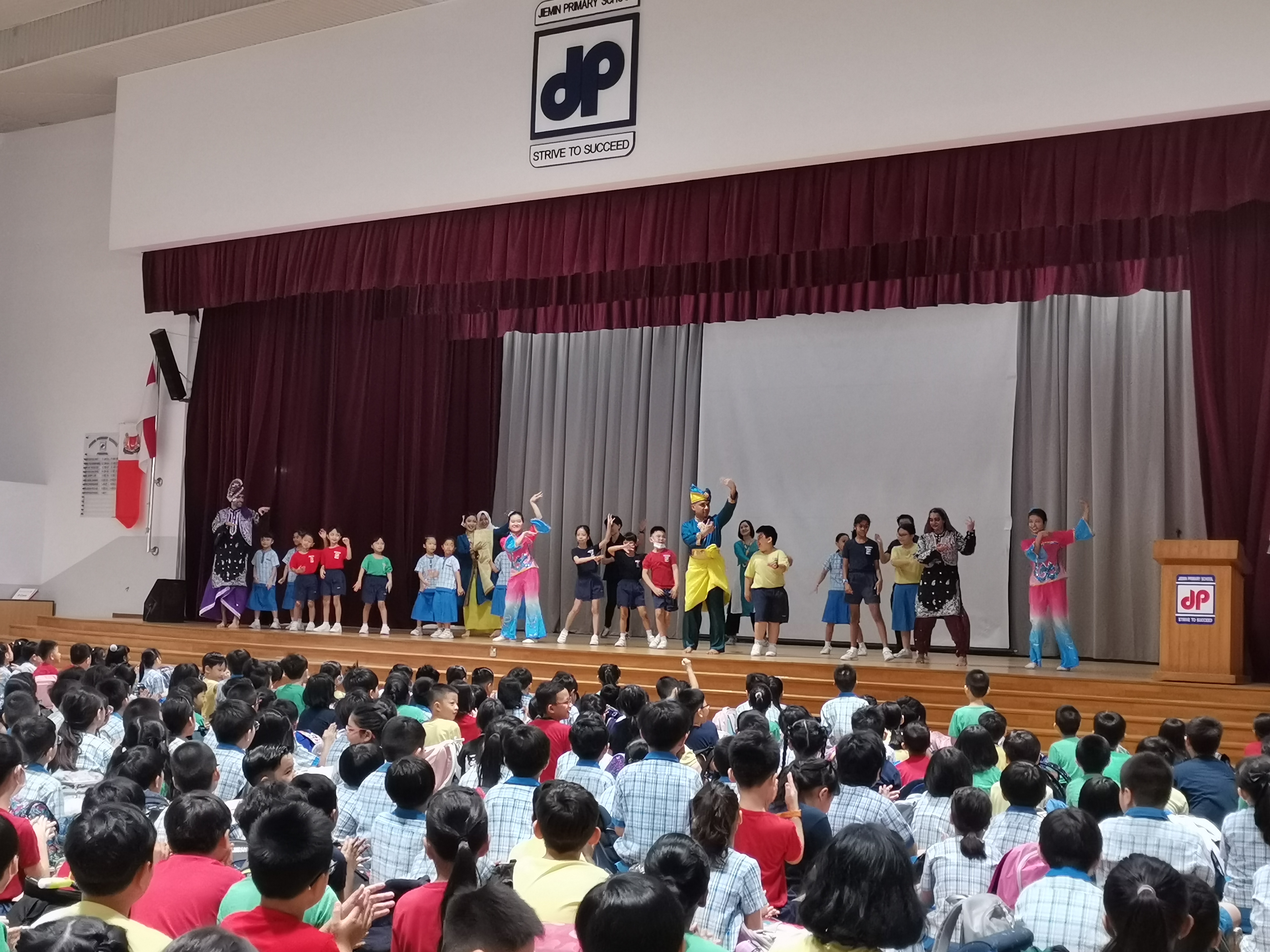 Students on stage dancing during RHD
