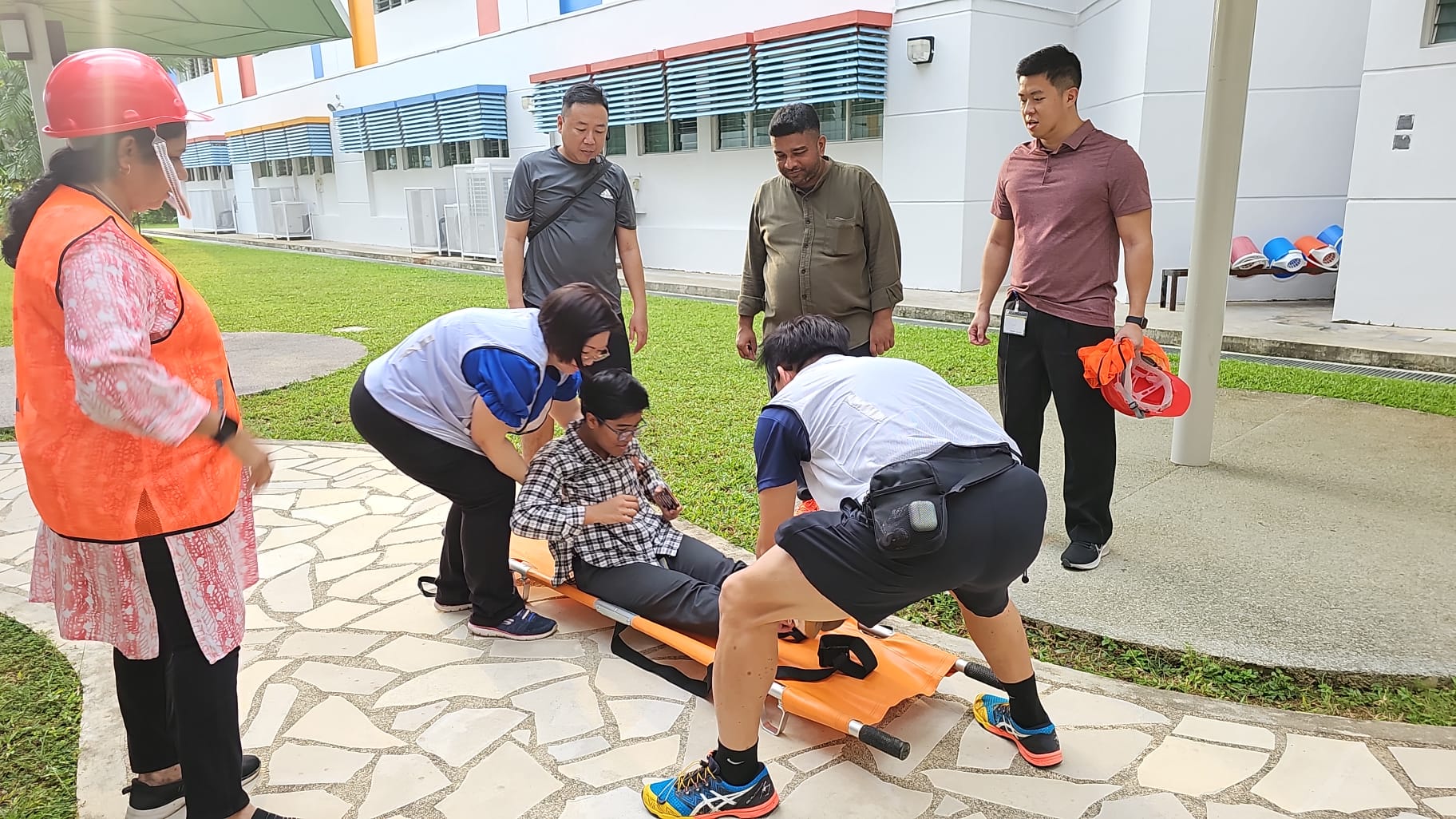 Teachers carrying out their roles during emergency preparedness drill.