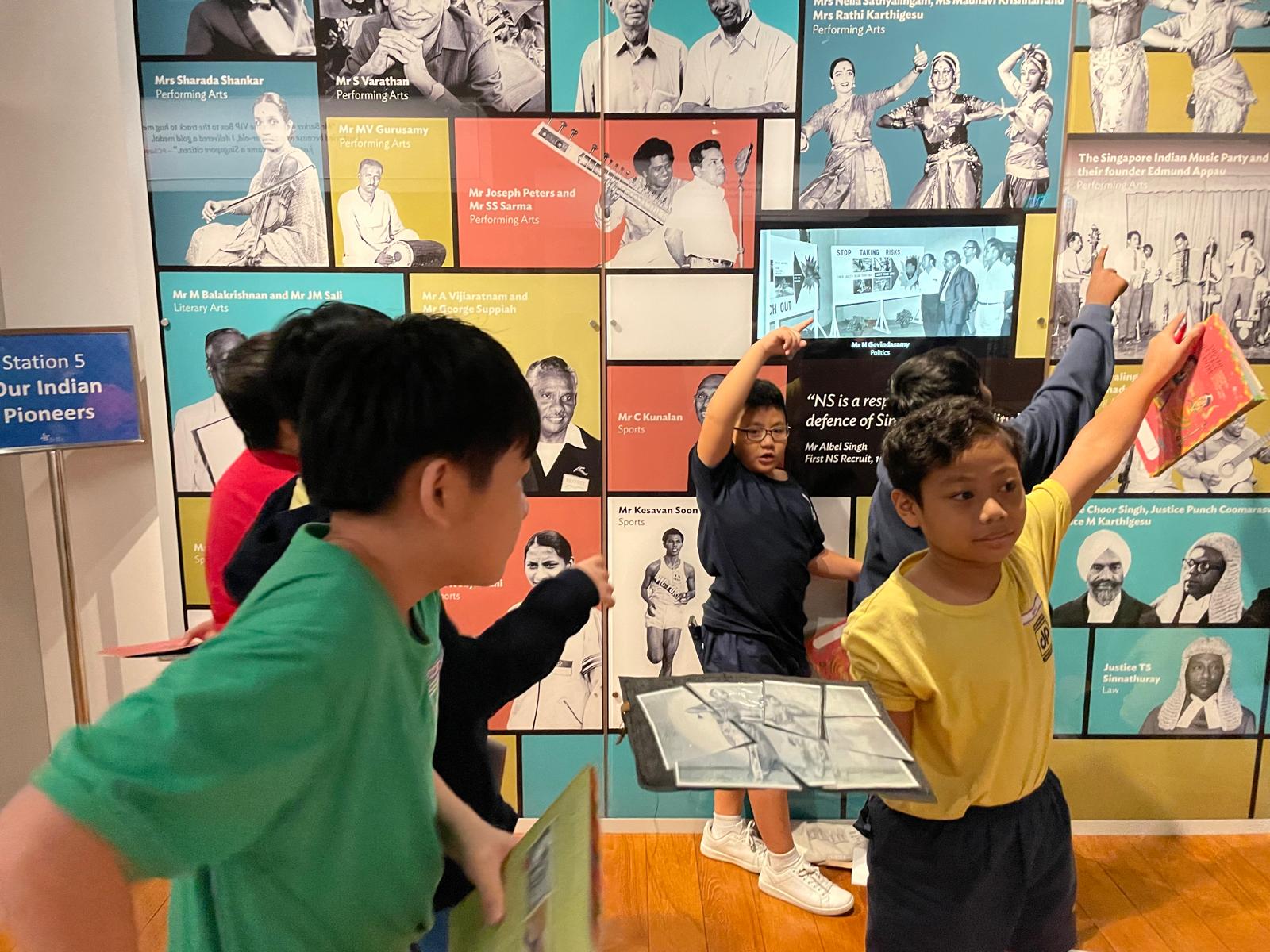 A group of students looking at the exhibits at Indian Heritage Gallery.